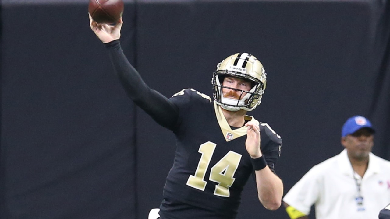 New Orleans Saints quarterback Andy Dalton (14) throws a pass during the  first half of a preseason NFL football game against the Los Angeles  Chargers in New Orleans, Friday, Aug. 26, 2022. (