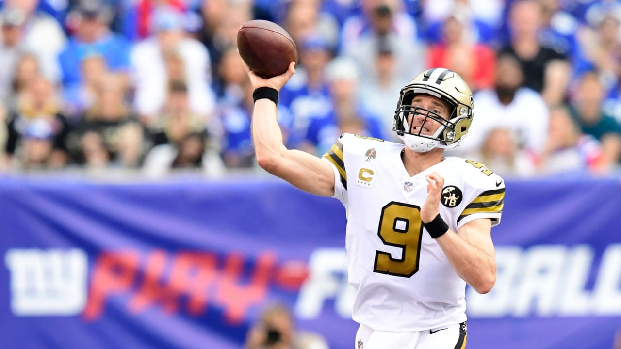 New Orleans Saints Drew Brees stretches on the sidelines before the game  against the New York Giants in week 4 of the NFL season at MetLife Stadium  in East Rutherford, New Jersey