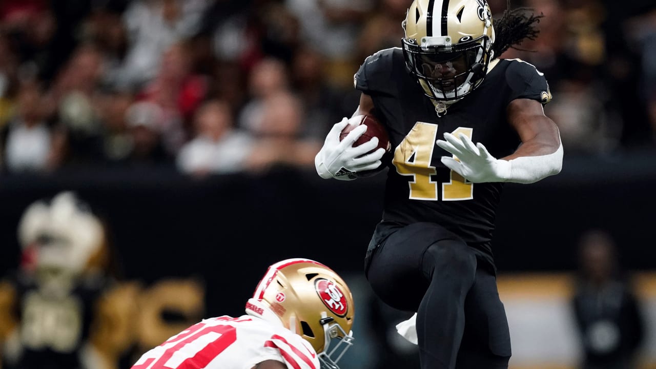 Alvin Kamara wears 49ers jersey, 'Make Africa Home Again' hat