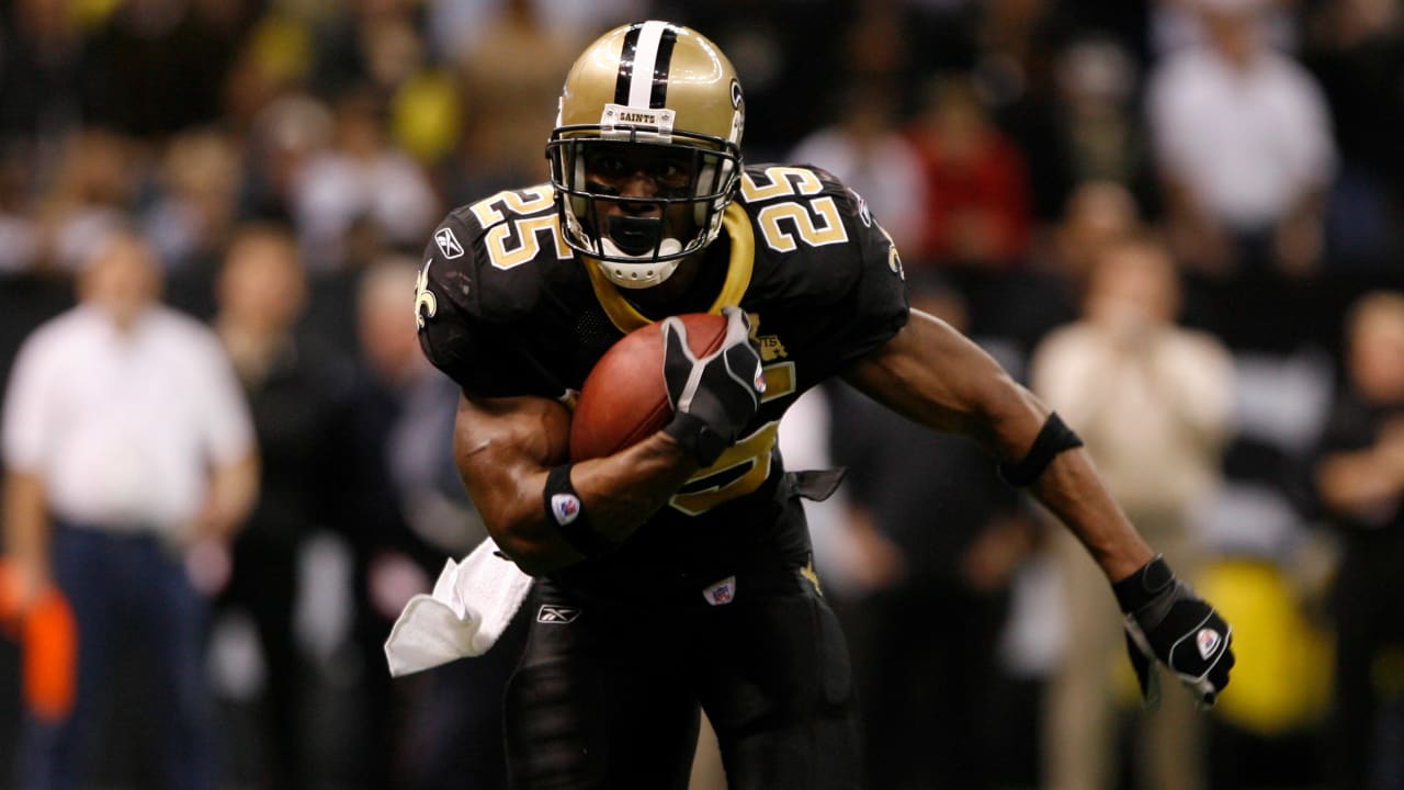 Reggie Bush celebrates with his New Orleans Saints teammates