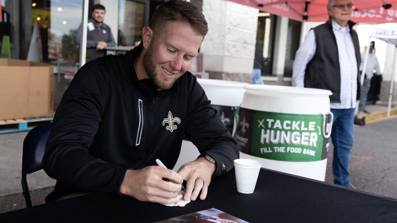Photos Saints host food drive with Rouses in Metairie