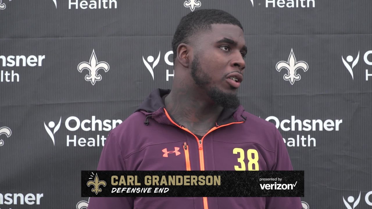 New Orleans Saints defensive end Carl Granderson signs a four-year