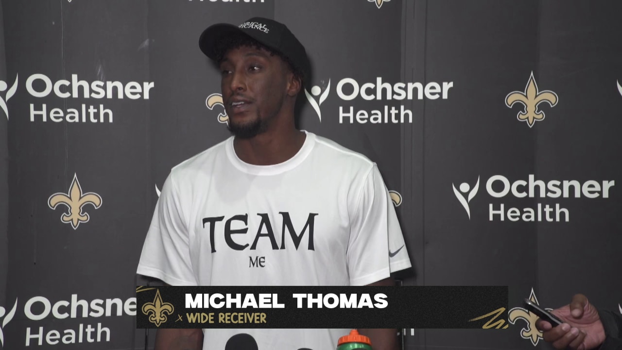 Saints' Michael Thomas returns to practice with a new deal