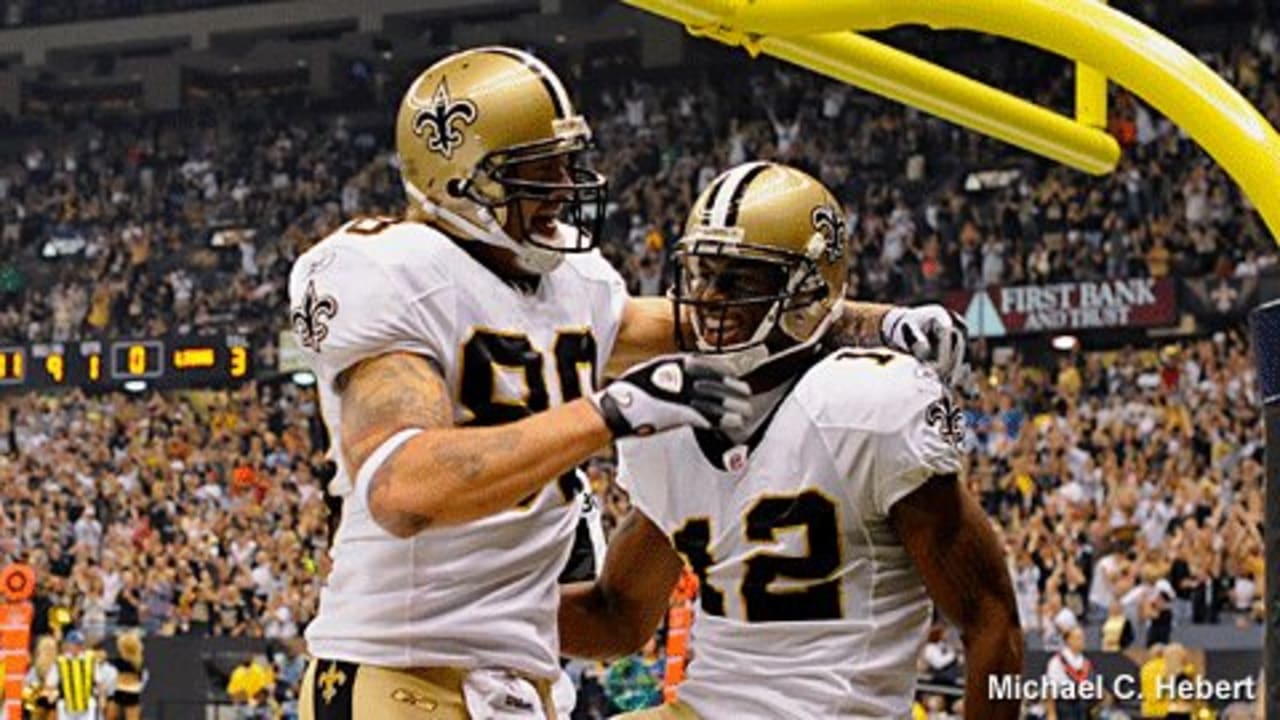 New Orleans Saints cornerback Tracy Porter (22) catches a few ball before  the start of practice