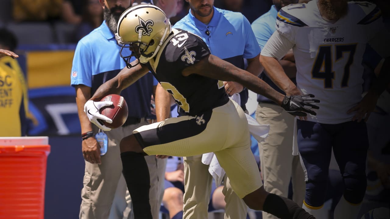 Miami Dolphins' Ted Ginn Jr. gains 12-yards on a reception in the