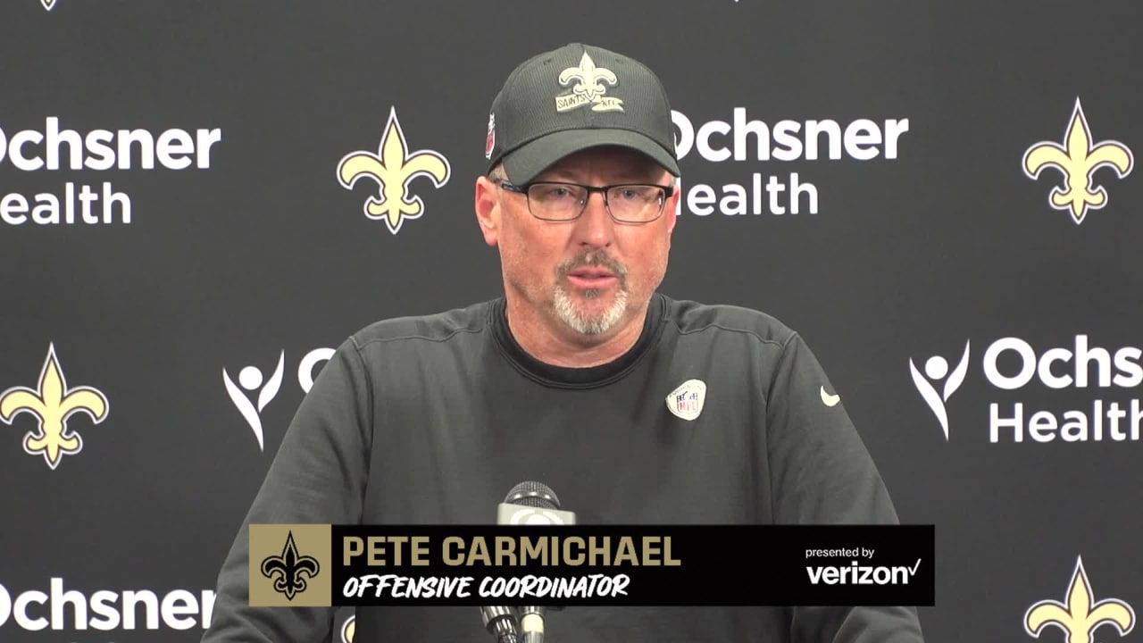 New Orleans, USA. August 13, 2023: New Orleans Saints Offensive Coordinator  Pete Carmichael looks up at the video board for a replay during NFL  pre-season game action between the New Orleans Saints