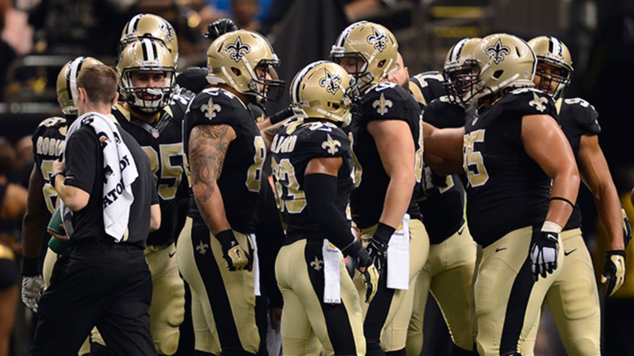 New Orleans Saints Drew Brees stretches on the sidelines before the game  against the New York Giants in week 4 of the NFL season at MetLife Stadium  in East Rutherford, New Jersey