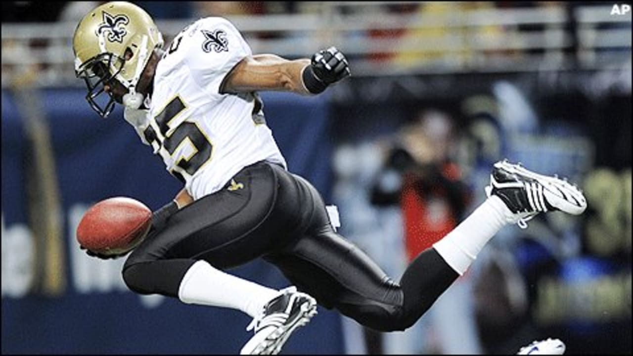 Reggie Bush of the New Orleans Saints carries the ball against the