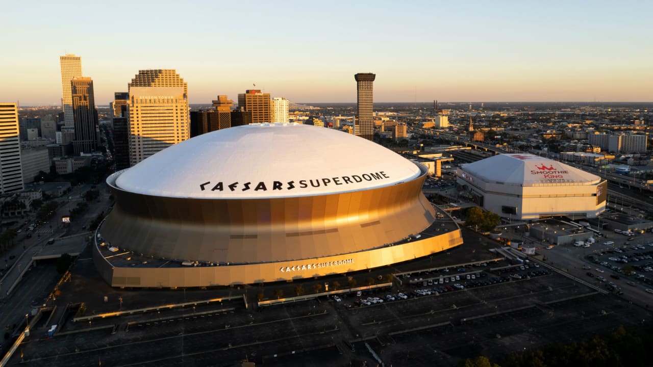 An aerial view of the Caesars Superdome (upper) and Smoothie King