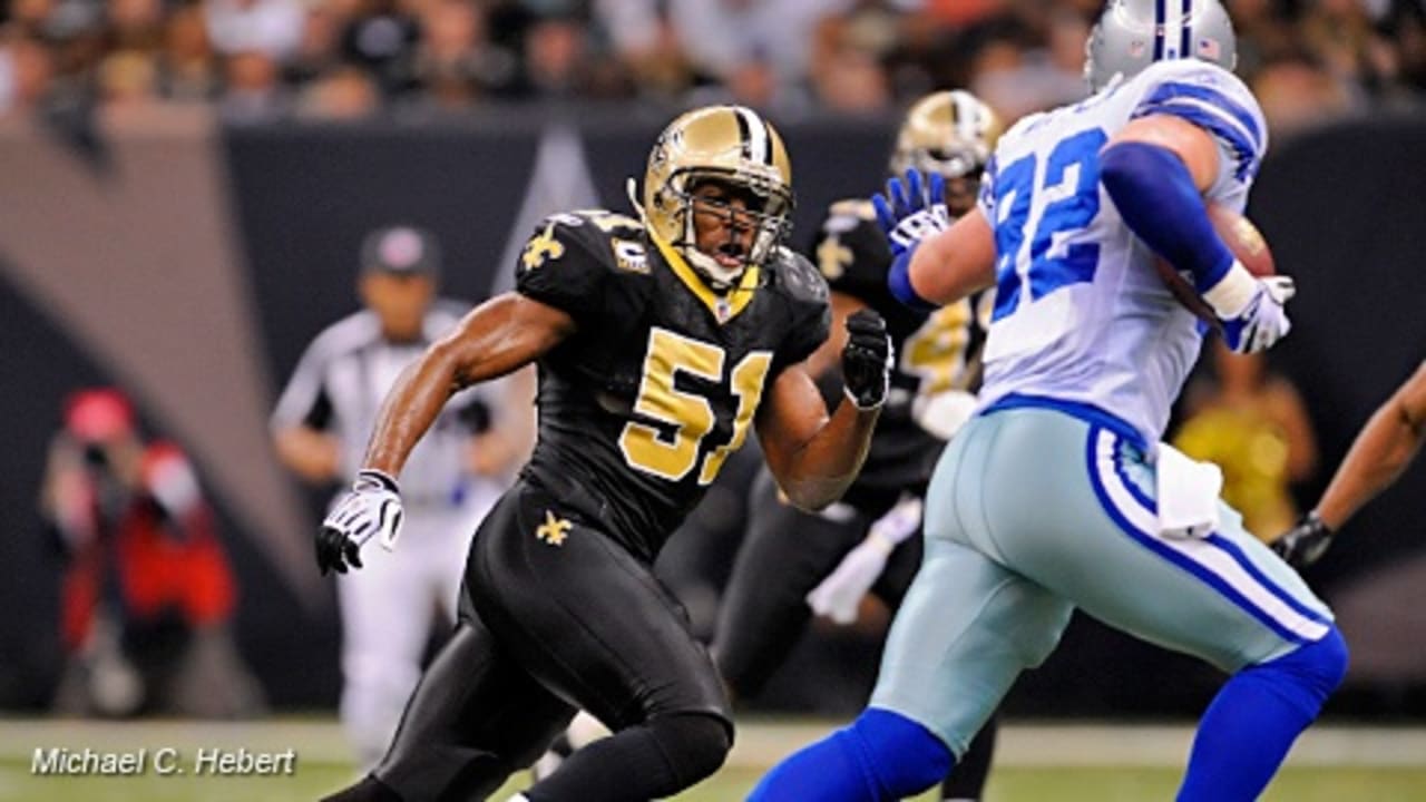 New Orleans Saints Scott Shanle jumps on Marques Colston after