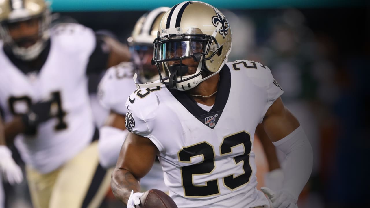 New Orleans Saints cornerback Marshon Lattimore (23) runs back an