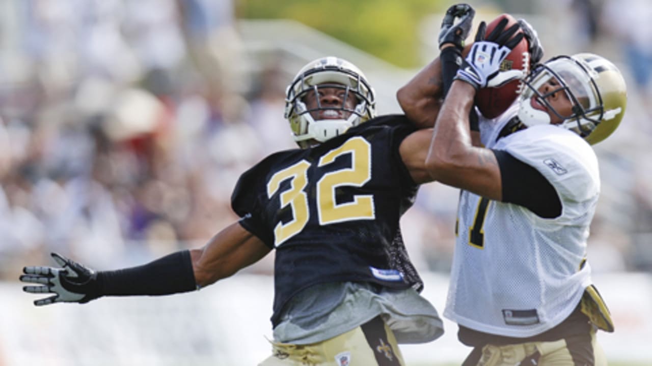 Jeremy Shockey of the New Orleans Saints walks to the sidelines in a