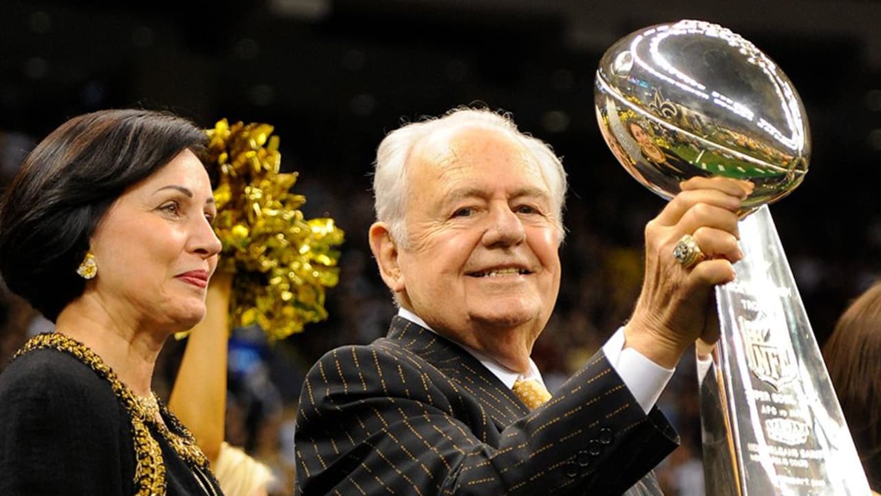 New Orleans Saints coach Sean Payton holds the George Halas trophy