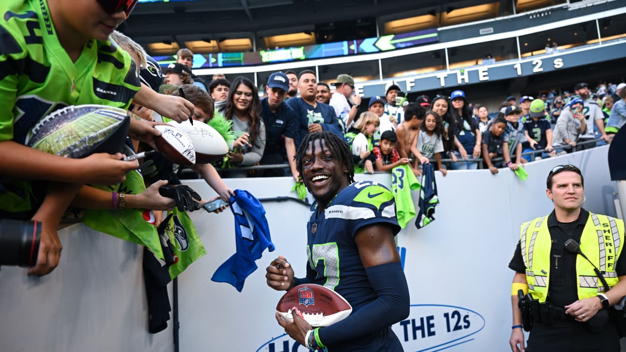 Seattle Seahawks cornerback Tariq Woolen (27) takes his stance