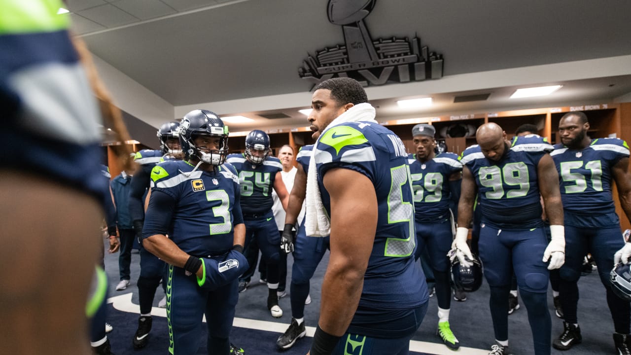 Seattle Seahawks head coach Pete Carroll, center, huddle with defensive  coordinator Ken Norton and defensive captain, Seattle Seahawks middle  linebacker Bobby Wagner (54) during the fourth quarter against the Arizona  Cardinals at