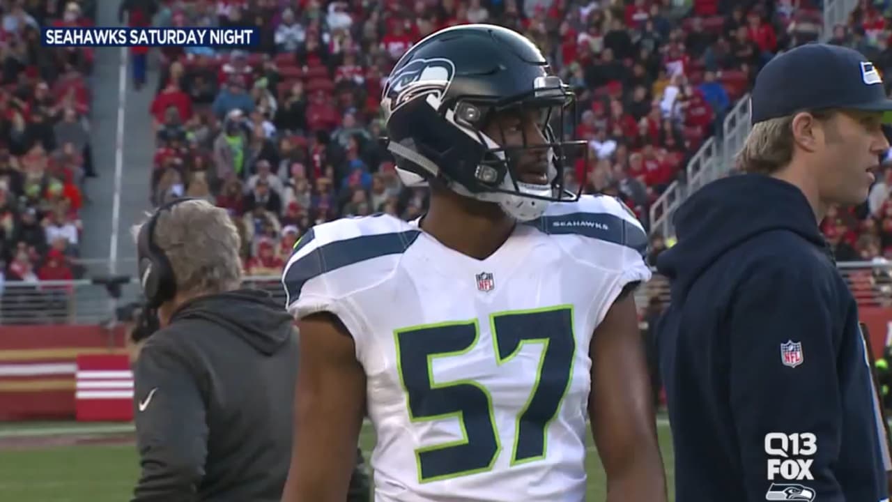 Seattle Seahawks outside linebacker Mike Morgan (57) wraps up