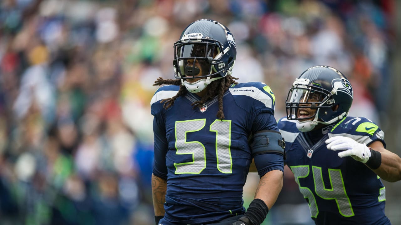 Seattle Seahawks cornerback Richard Sherman wears a mask to stay warm  during warmups before an NFL football game against the Los Angeles Rams,  Thursday, Dec. 15, 2016, in Seattle. (AP Photo/Elaine Thompson