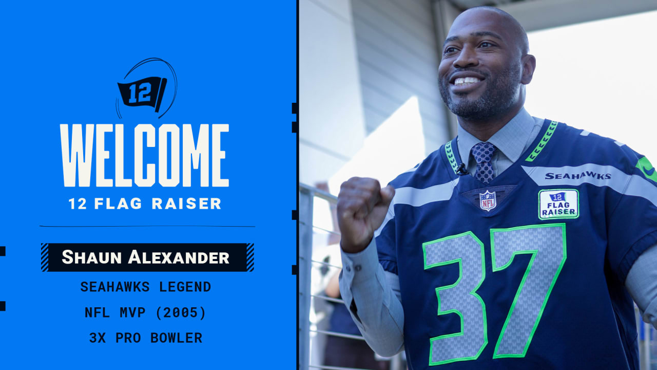 PHOTOS Seahawks Legend Shaun Alexander Raises The 12 Flag