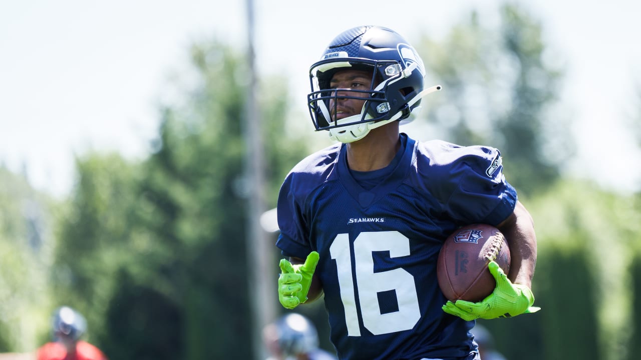 Seattle Seahawks wide receiver Tyler Lockett (16) looks on during