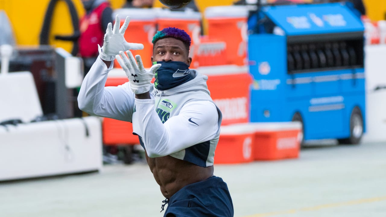 DK Metcalf Sports New Blue-And-Purple Hair Style For Week 15