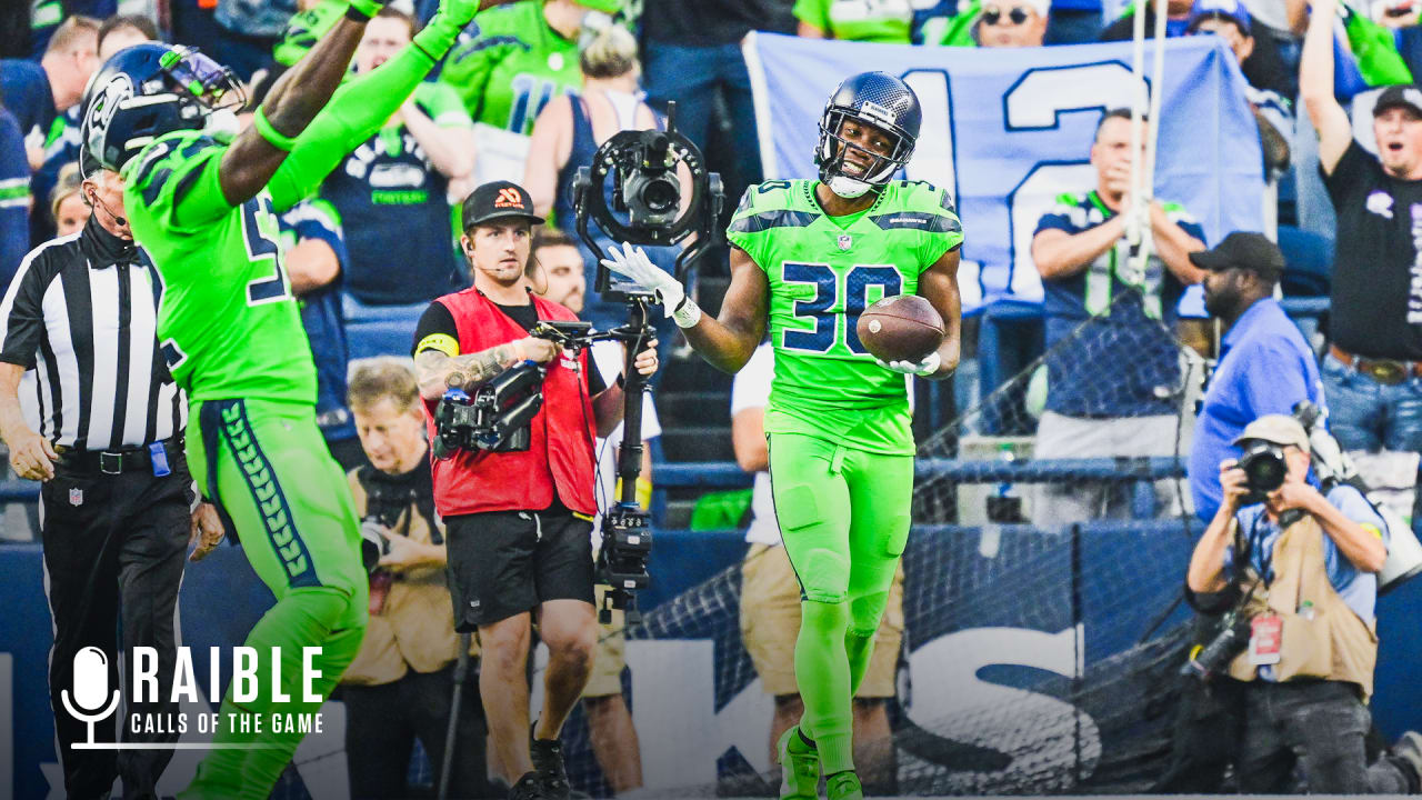 Seattle Seahawks cornerback Michael Jackson (30) tosses a football