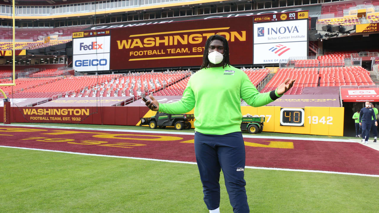 Seattle Seahawks offensive tackle Tommy Champion stretches during