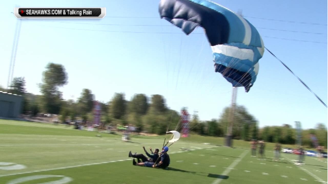 Former Seahawks player Marcus Trufant skydives into training camp