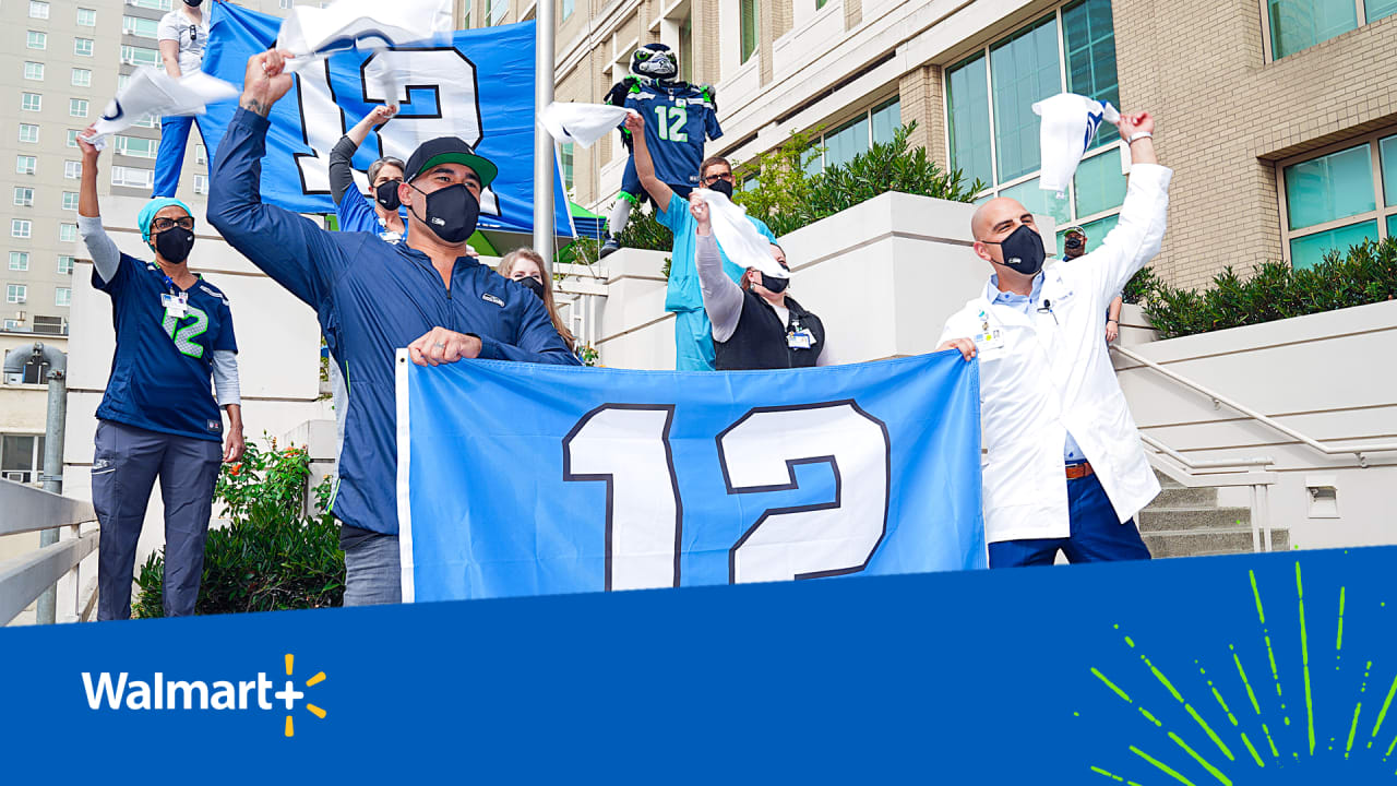 Getting our spirit on at the Seahawks Pro Shop - New Day NW 