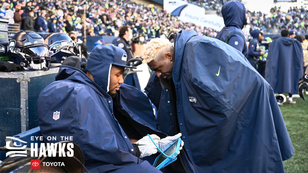 Logos for the NFL's Salute to Service event are posted on the field before  an NFL football game between the Seattle Seahawks and Arizona Cardinals,  Sunday, Nov. 21, 2021, in Seattle. (AP