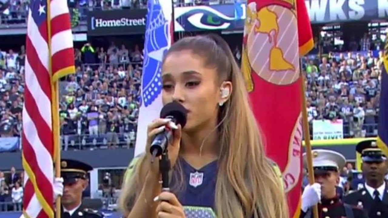 Ariana singing the national anthem at a Seattle Seahawks game in