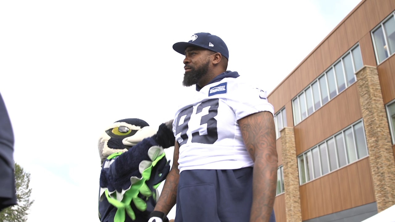 Seattle Seahawks defensive tackle Tony McDaniel (99) bats down a