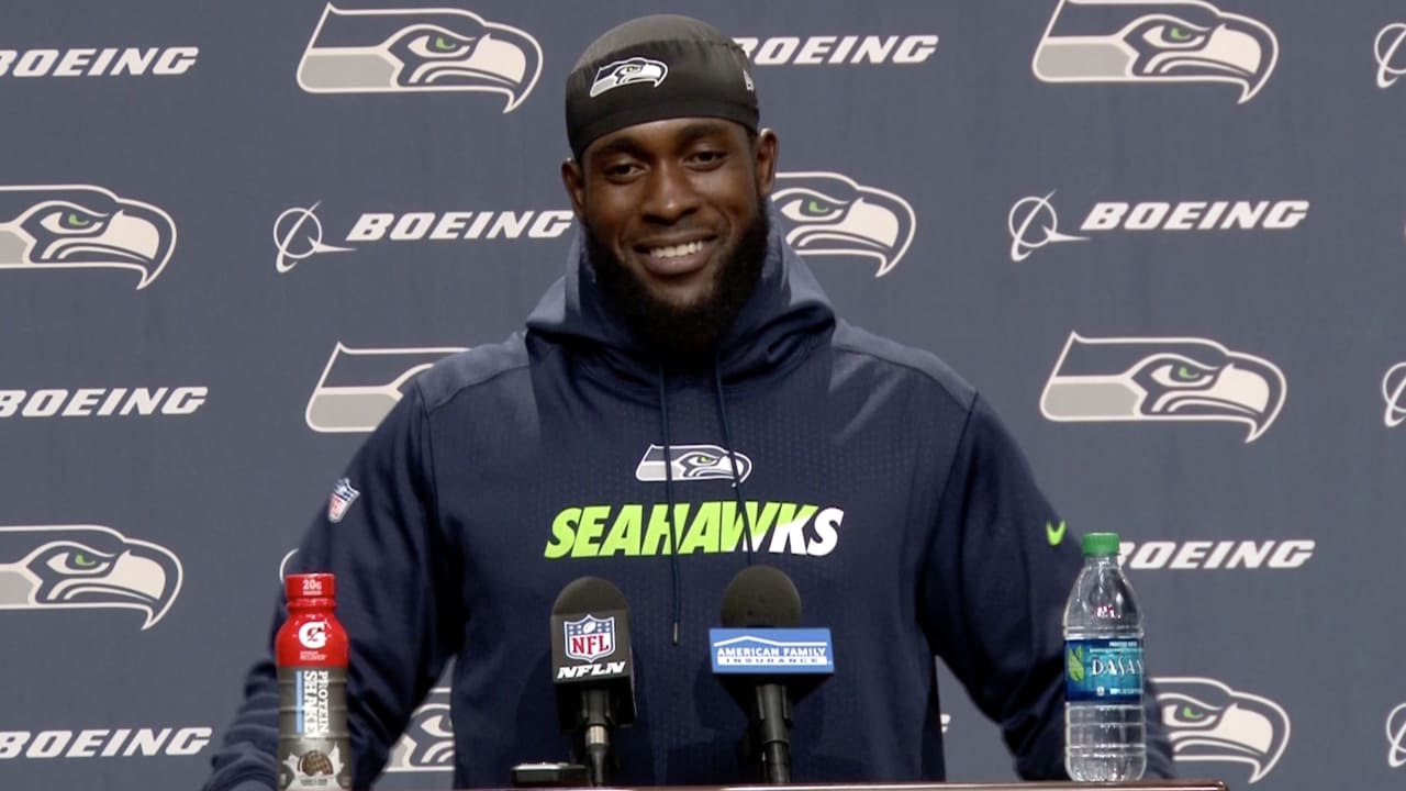 Keanu Neal keeps a Kam Chancellor jersey in his locker