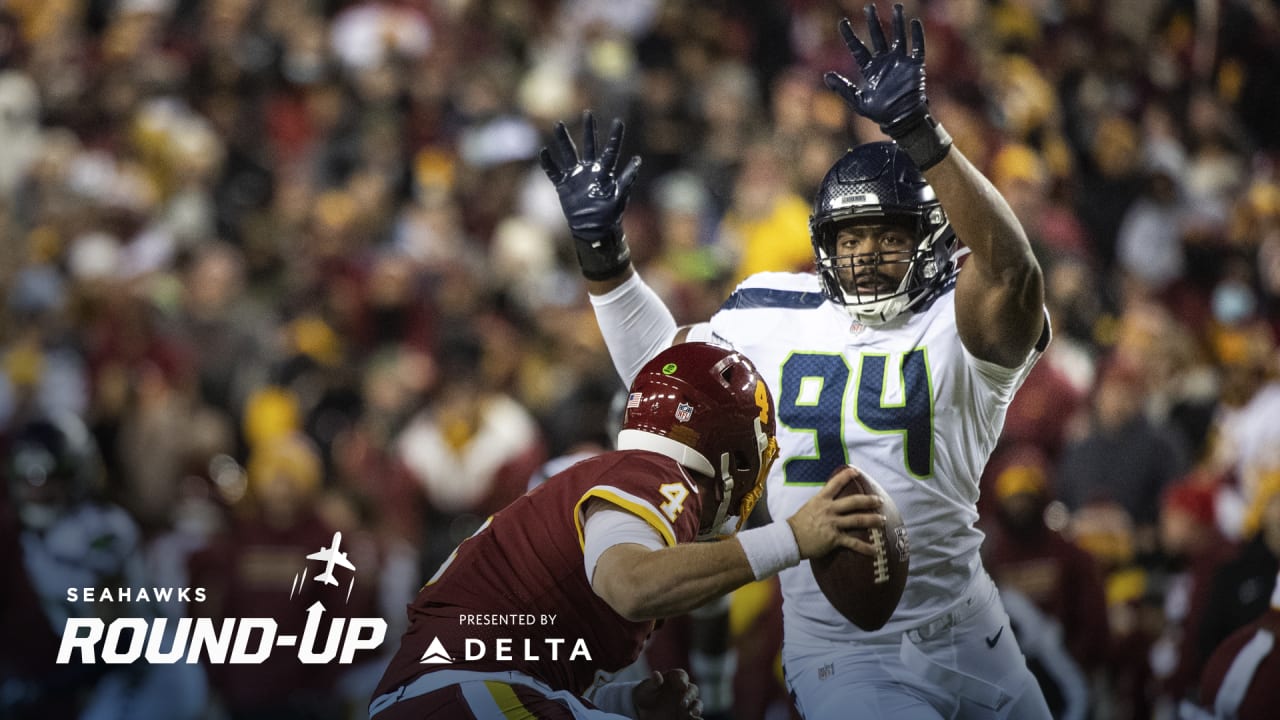 Arizona Cardinals' James Conner smiles as he heads off the field after the  team beat the Seattle Seahawks in an NFL football game, Sunday, Nov. 21,  2021, in Seattle. The Cardinals won