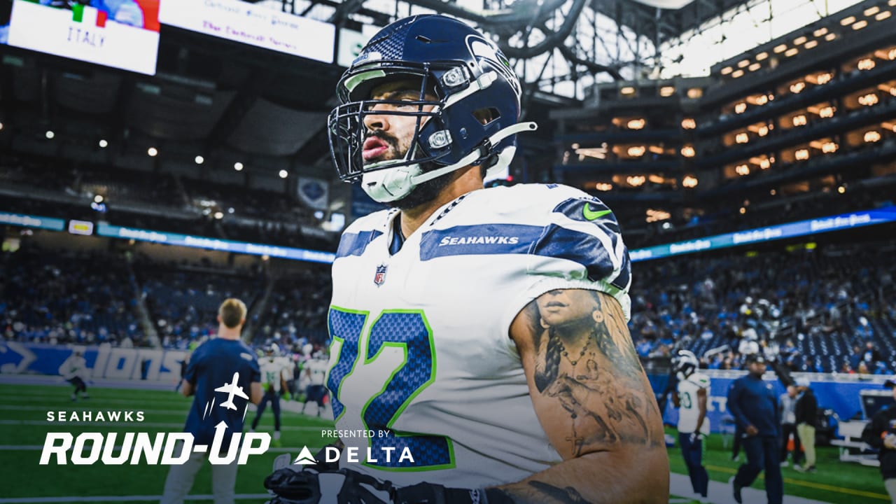 Seattle Seahawks tackle Abraham Lucas (72) walks on the field