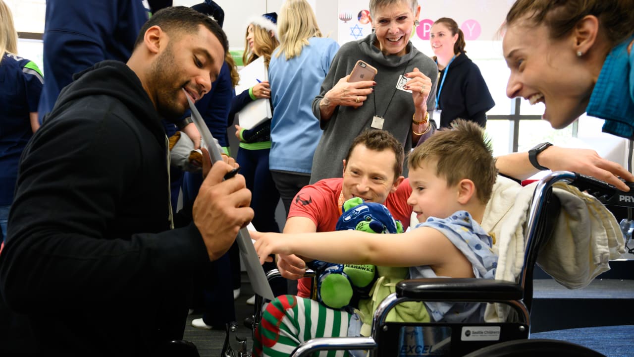 Russell Wilson and Ciara Mark 'Day 1' in Denver at Children's Hospital  After Wilson's Trade to the Broncos