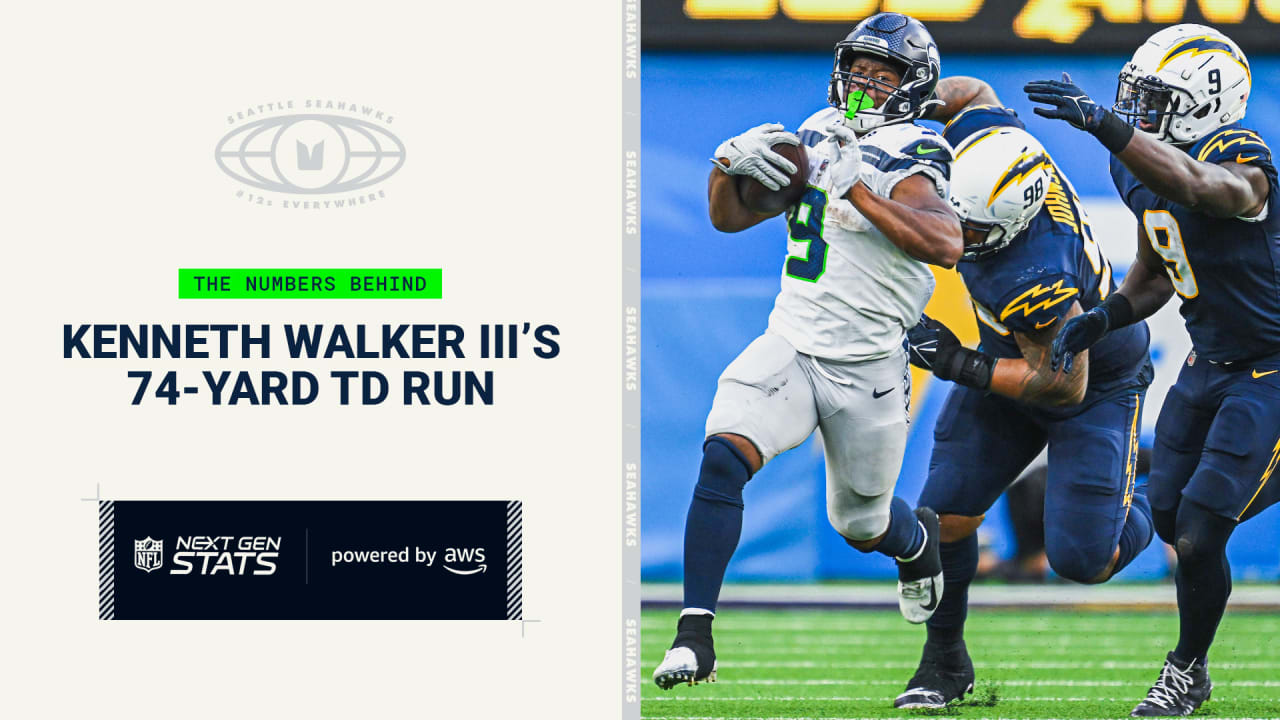 Seattle Seahawks running back Kenneth Walker III (9) runs down the