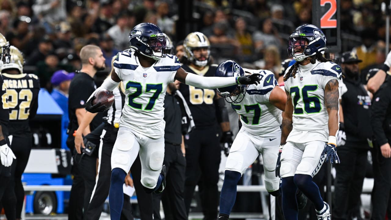 Seattle Seahawks cornerback Tariq Woolen (27) warms up before an NFL  football game against the Carolina