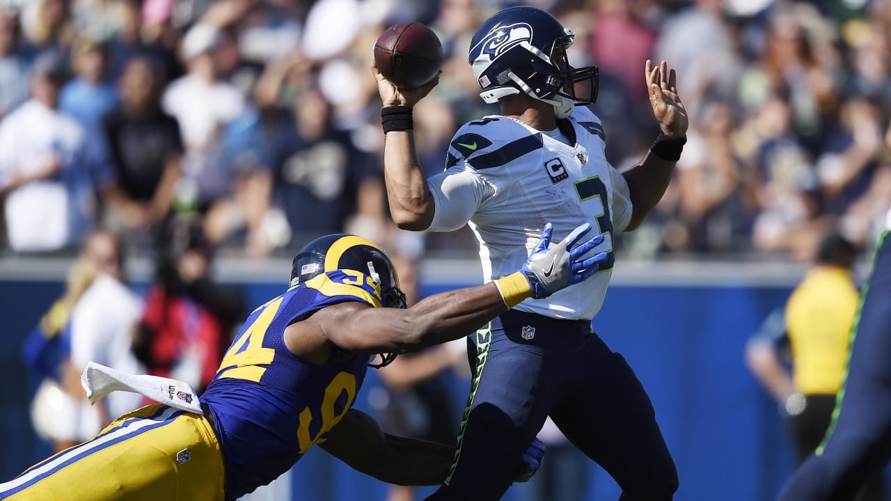 Christine Michael of the Green Bay Packers fends off a tackle