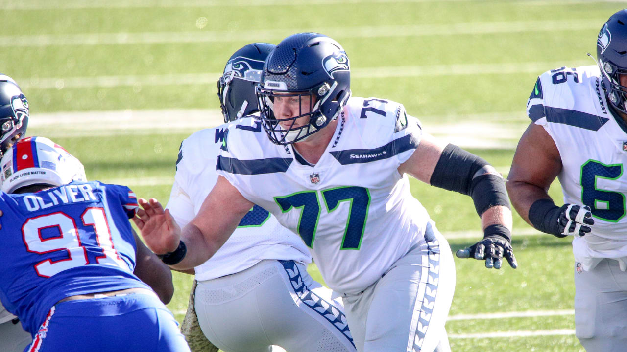 Seattle Seahawks running back Chris Carson gestures while smiling after an  NFL football game against the Dallas Cowboys, Sunday, Sept. 27, 2020, in  Seattle. The Seahawks won 38-31. (AP Photo/Stephen Brashear Stock