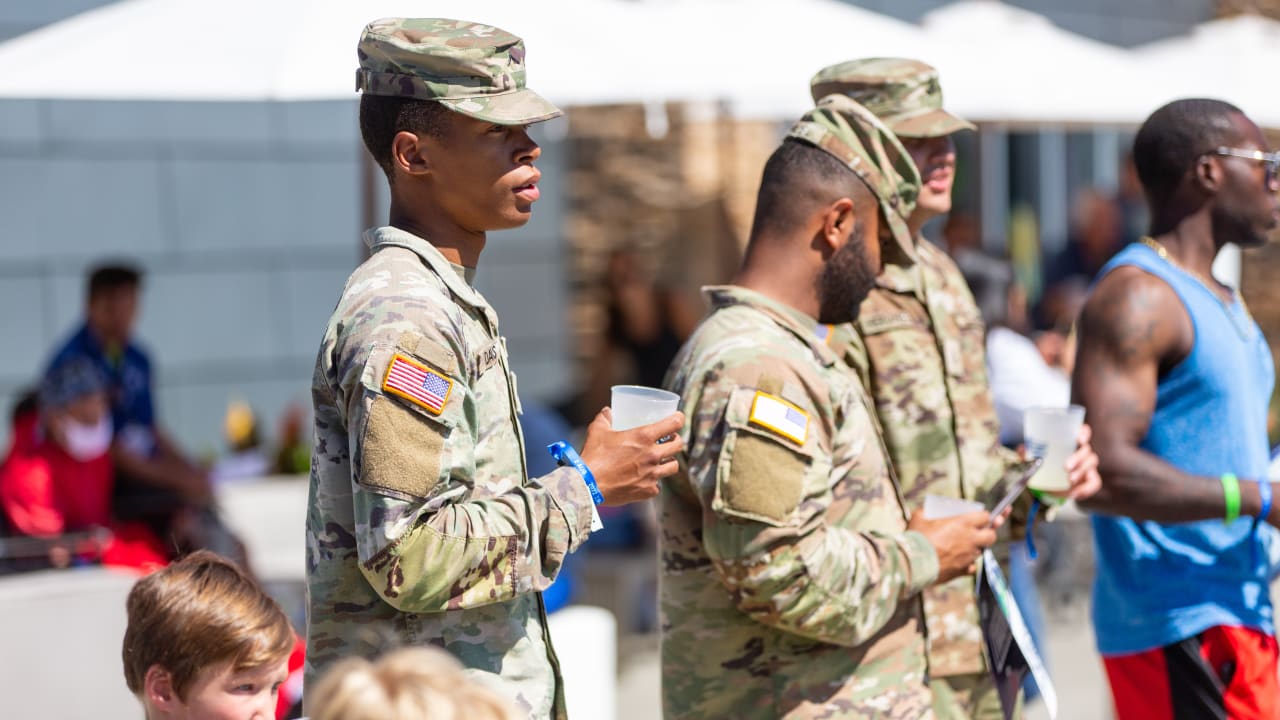 Seattle Seahawks - Lock taking time to meet with our military at practice  yesterday. Salute to service moment presented by USAA #SaluteToService