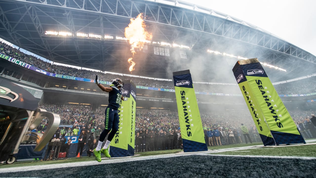 Charitybuzz: Ultimate Seattle Seahawks Package for 4: Pre-Game 12 Flag  Raising Experience, 4 Club Level Tickets and Post-Game Mid-Field Photo on  December 15 or 24 at CenturyLink Field