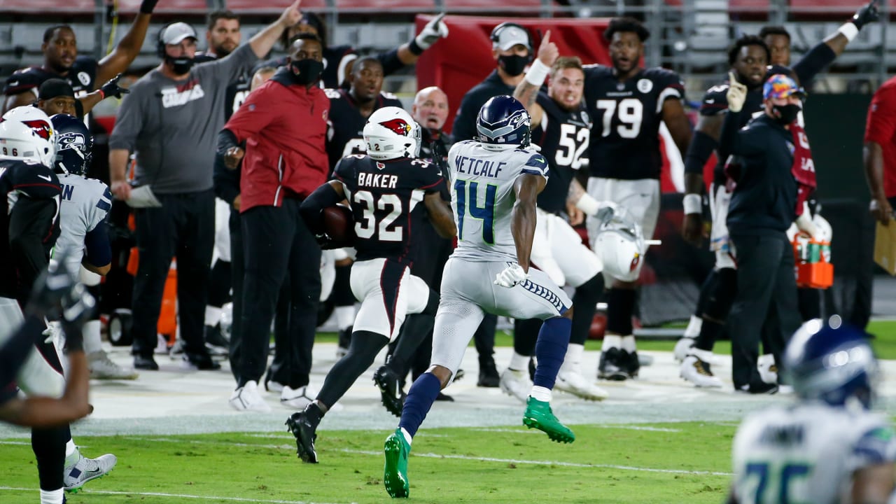 Seattle Seahawks linebacker Bobby Wagner loops around the edge for a sack  of New York Giants quarterback Daniel Jones