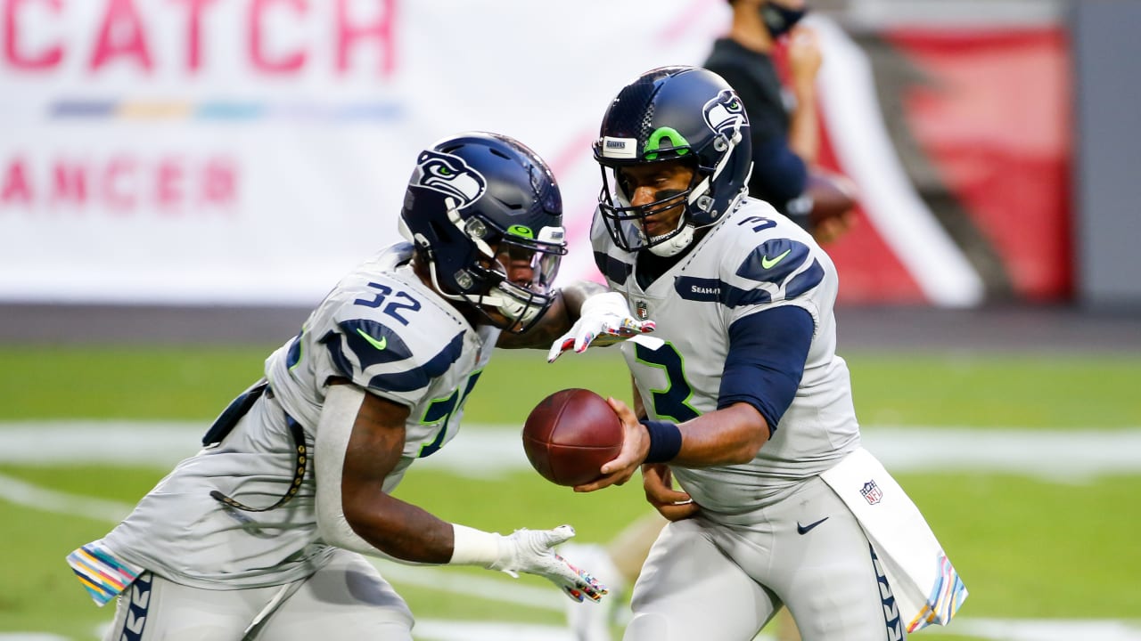 Seattle Seahawks cornerback Chris Steele holds a football during