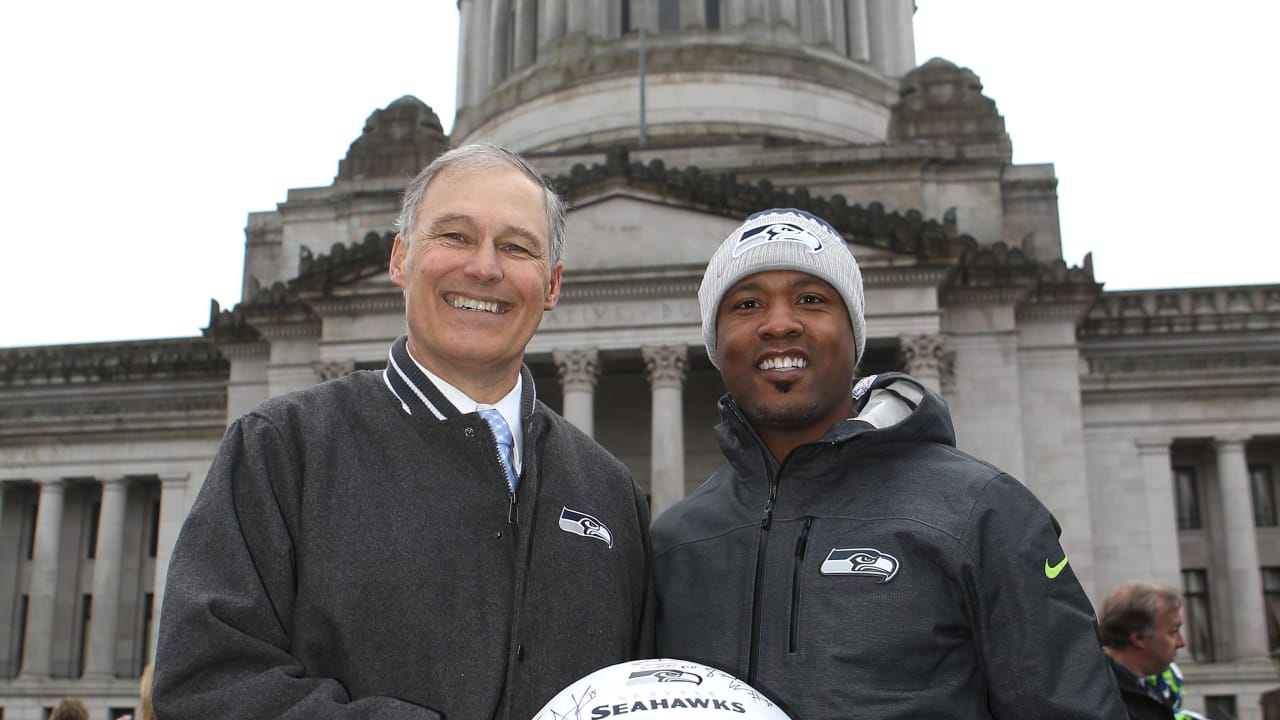 PHOTOS Governor Jay Inslee And Lawyer Milloy Raise 12 Flag At Capitol