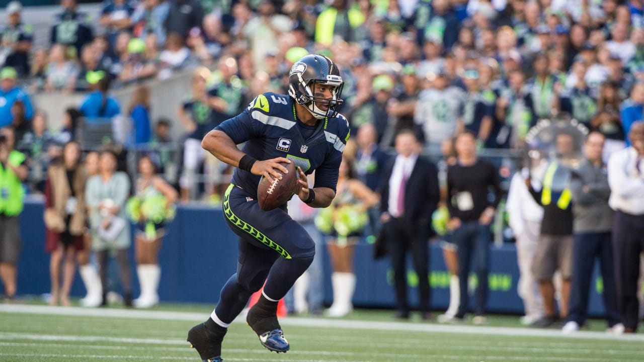 Seattle Seahawks including Thomas Rawls (34) and Cassius Marsh wear the NFL  color rush uniforms before an NFL football game against the Los Angeles  Rams, Thursday, Dec. 15, 2016, in Seattle. (AP