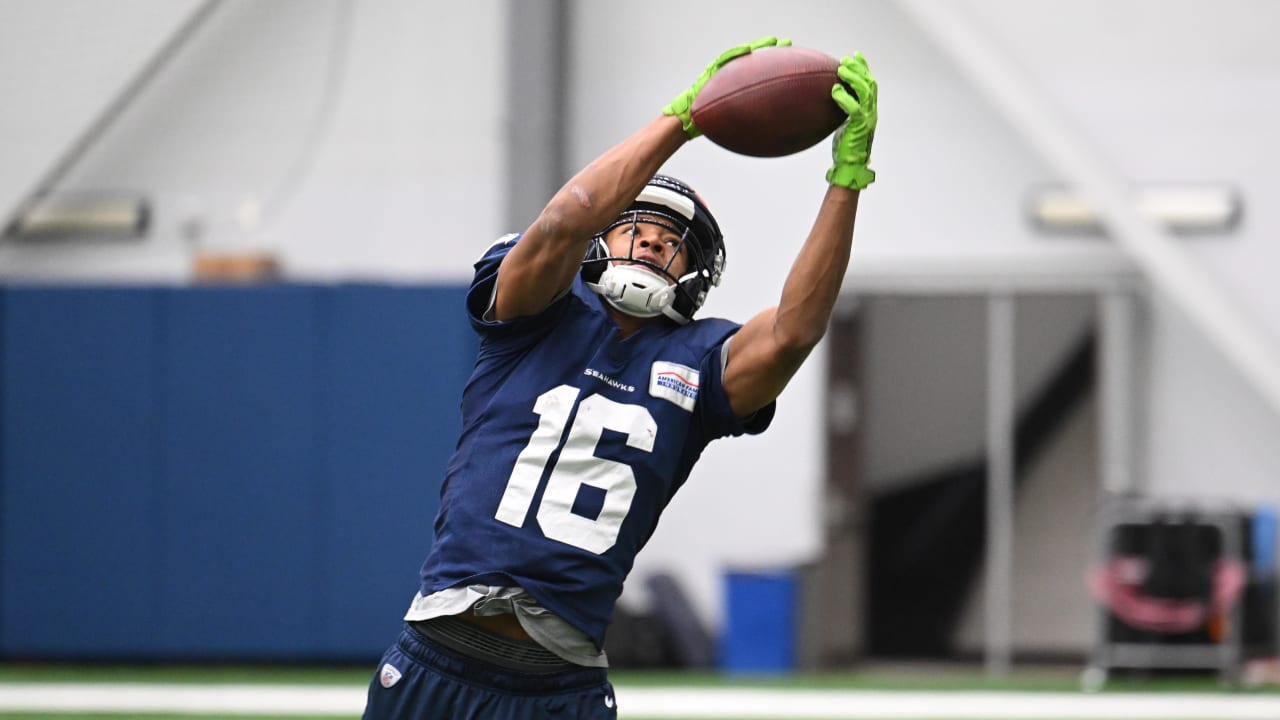 Seattle Seahawks wide receiver Tyler Lockett (16) runs the ball