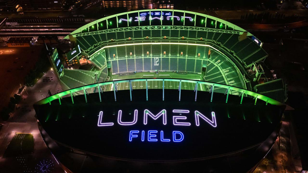 PHOTOS Lumen Field Lit In Action Green In Advance Of Monday Night Football