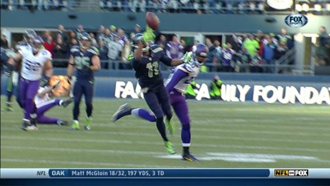 Seattle Seahawks wide receiver/kick off specialists Percy Harvin (11)  returns the opening kickoff against the Chicago Bears 46 yards in the  quarter of a pre-season game at CenturyLink Field in Seattle, Washington