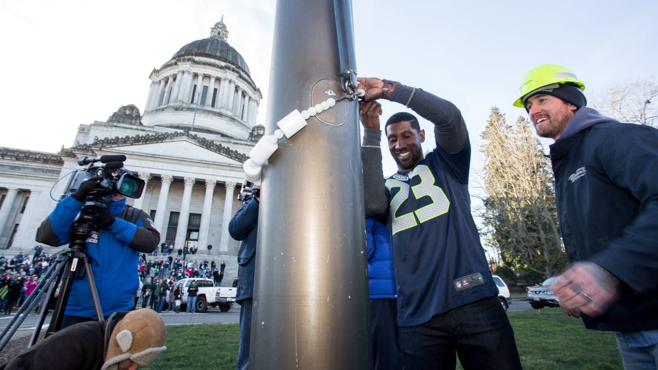 Seahawks Legend Marcus Trufant Raises 12 Flag at State Capitol