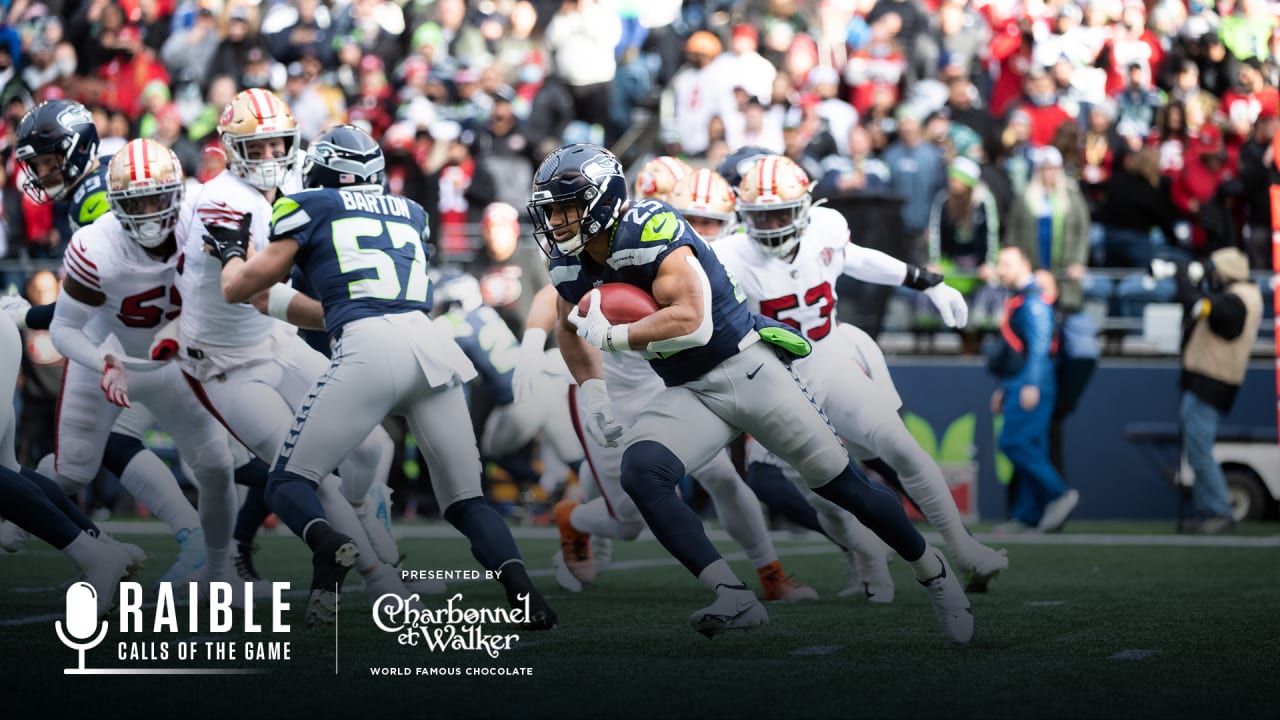 Travis Homer of the Seattle Seahawks runs with the ball in the second